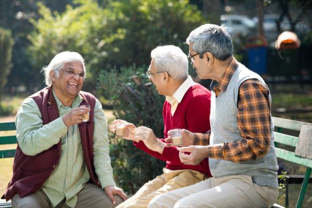 Three men drinking tea